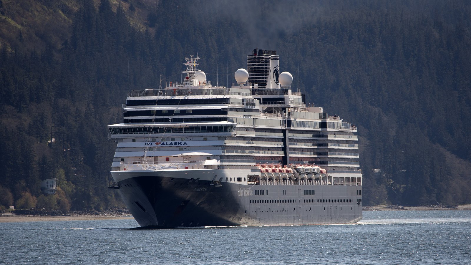 Eurodam at the quayside with the ship's name on the bow
