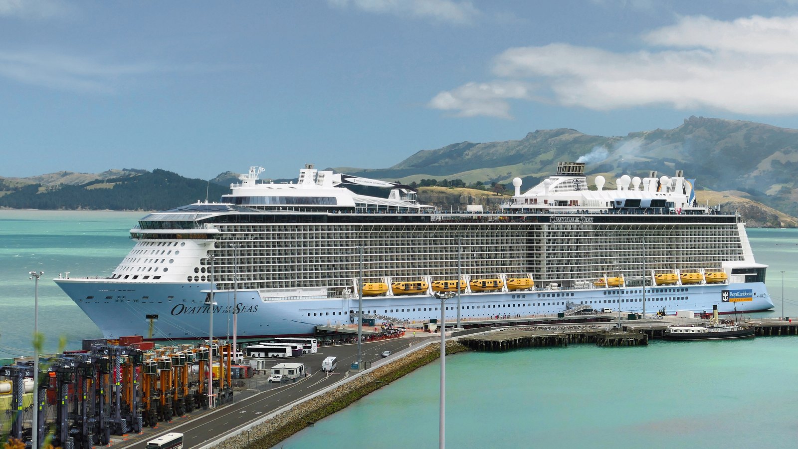 Ovation of the Seas at sea with the ship's name on the hull