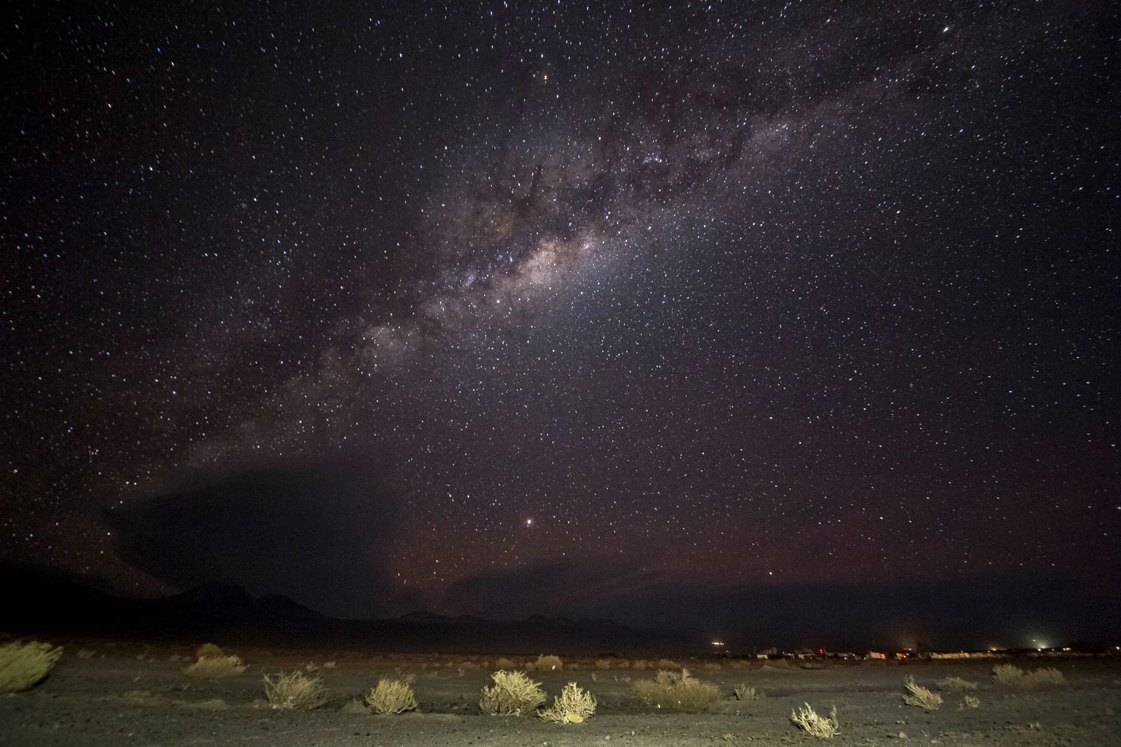 Breathtaking view of the Milky Way over the desert landscape in San Pedro de Atacama.