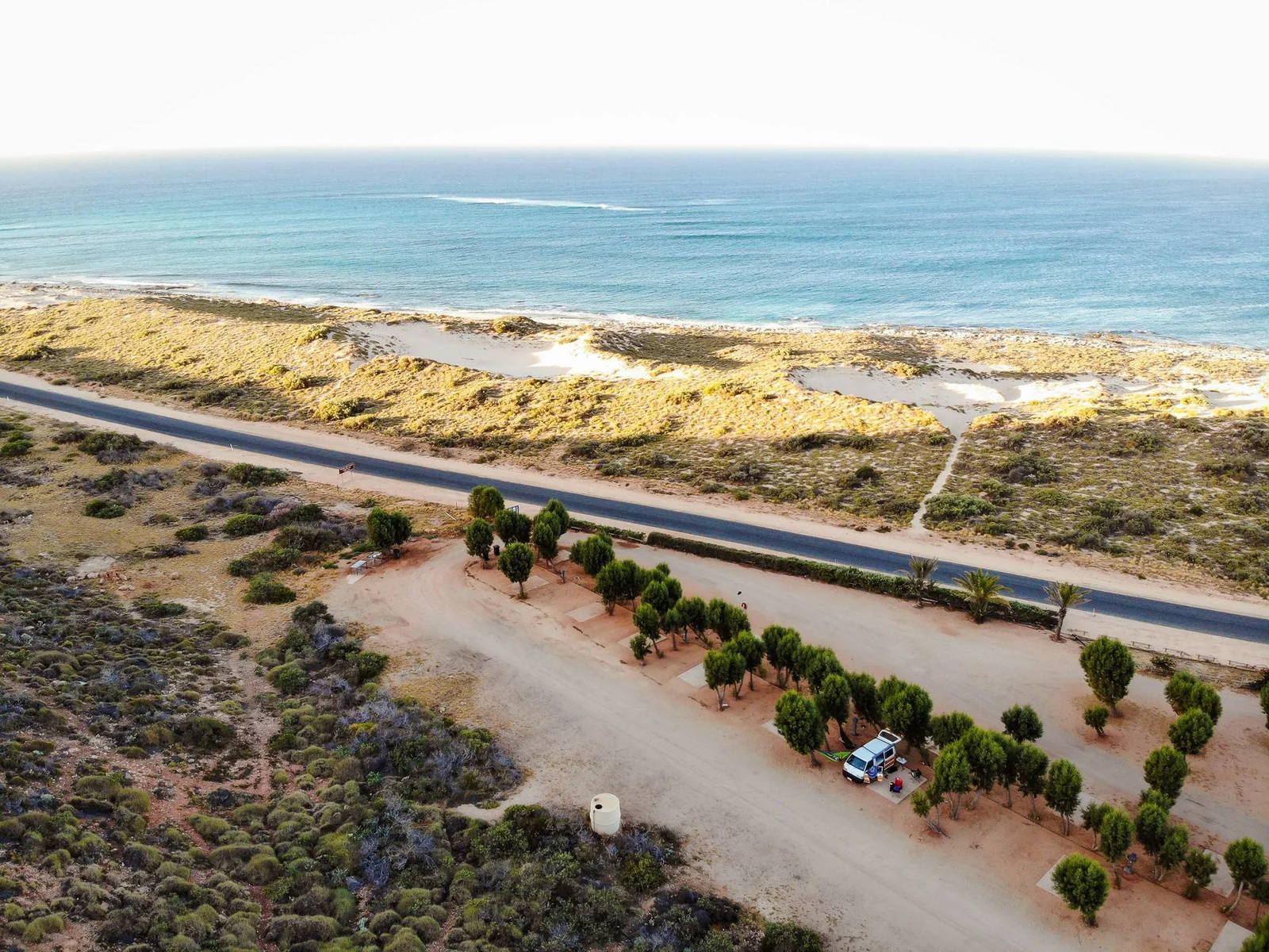 Aerial photograph showcasing the scenic coastline and road near Exmouth, Western Australia.