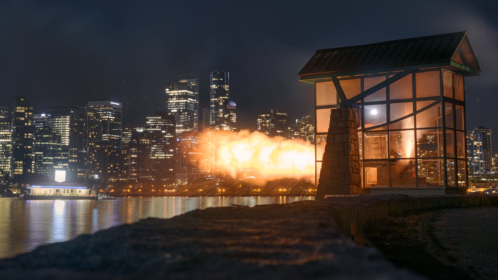 The Nine O'Clock Gun firing across Coal Harbour at 21:00 sharp