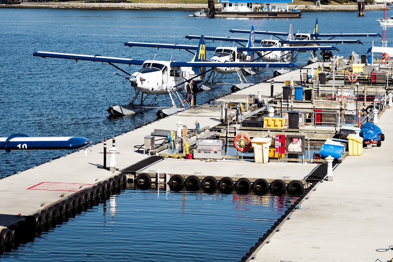 Float planes moored at a dock on the water in Vancouver