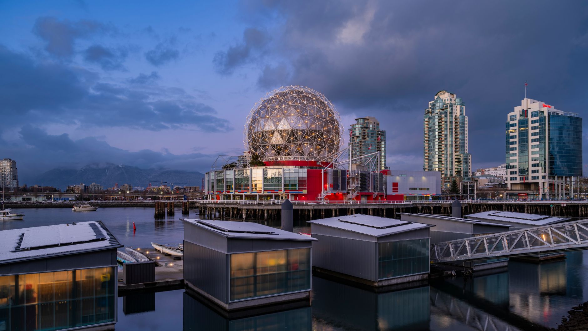 Science World and the False Creek waterfront at dusk