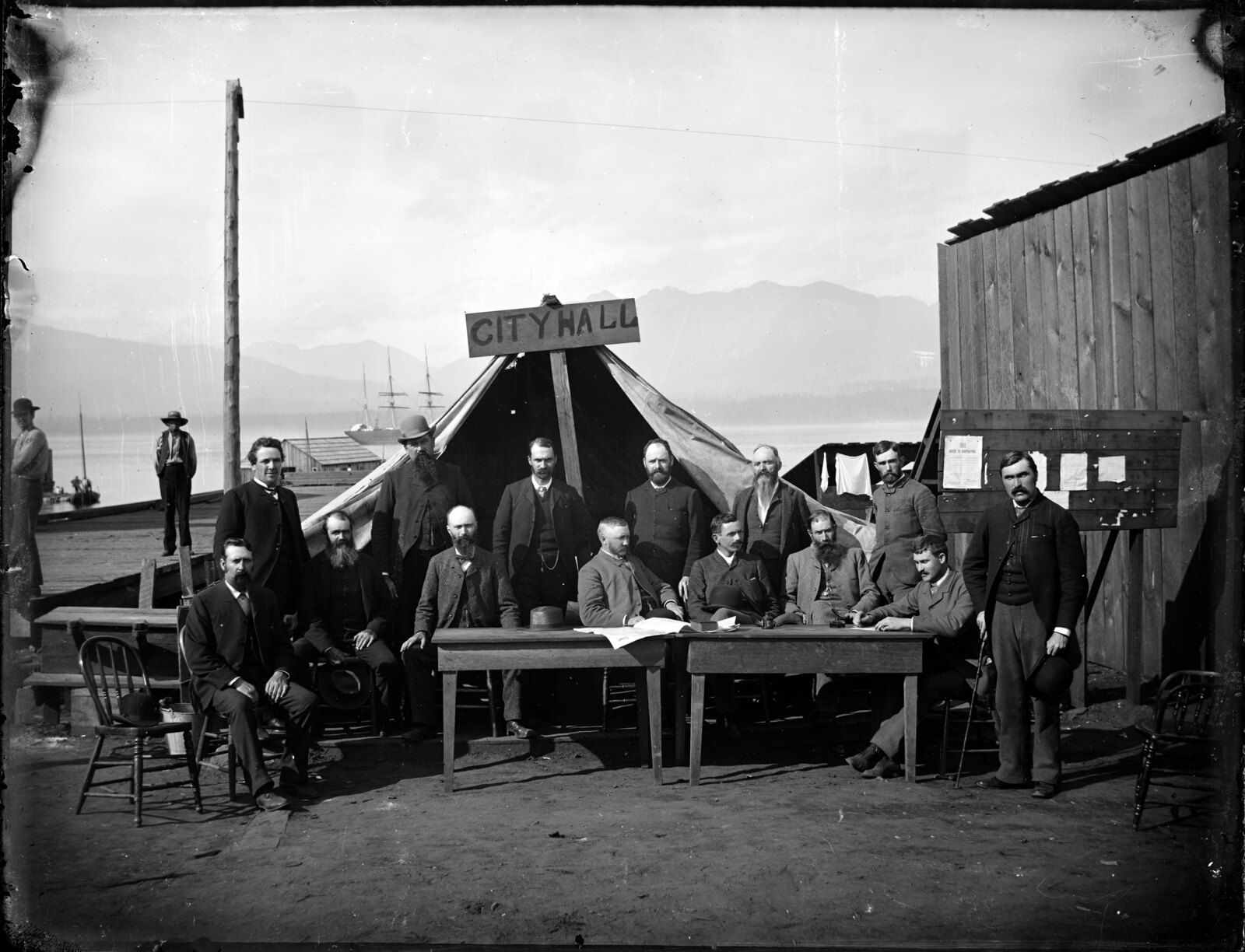 Vancouver's city council photographed in a tent shortly after the 1886 fire