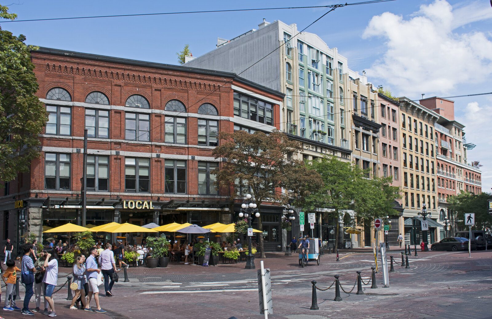 Brick buildings on Alexander Street at the edge of Maple Tree Square, Gastown