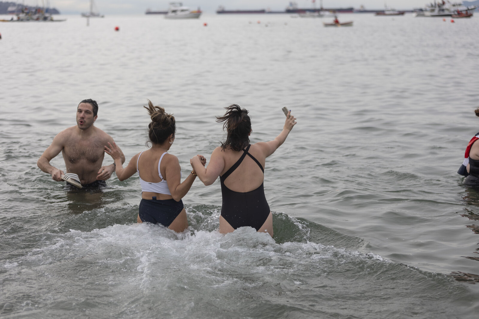 Swimmers in the water at English Bay during the Vancouver Polar Bear Swim