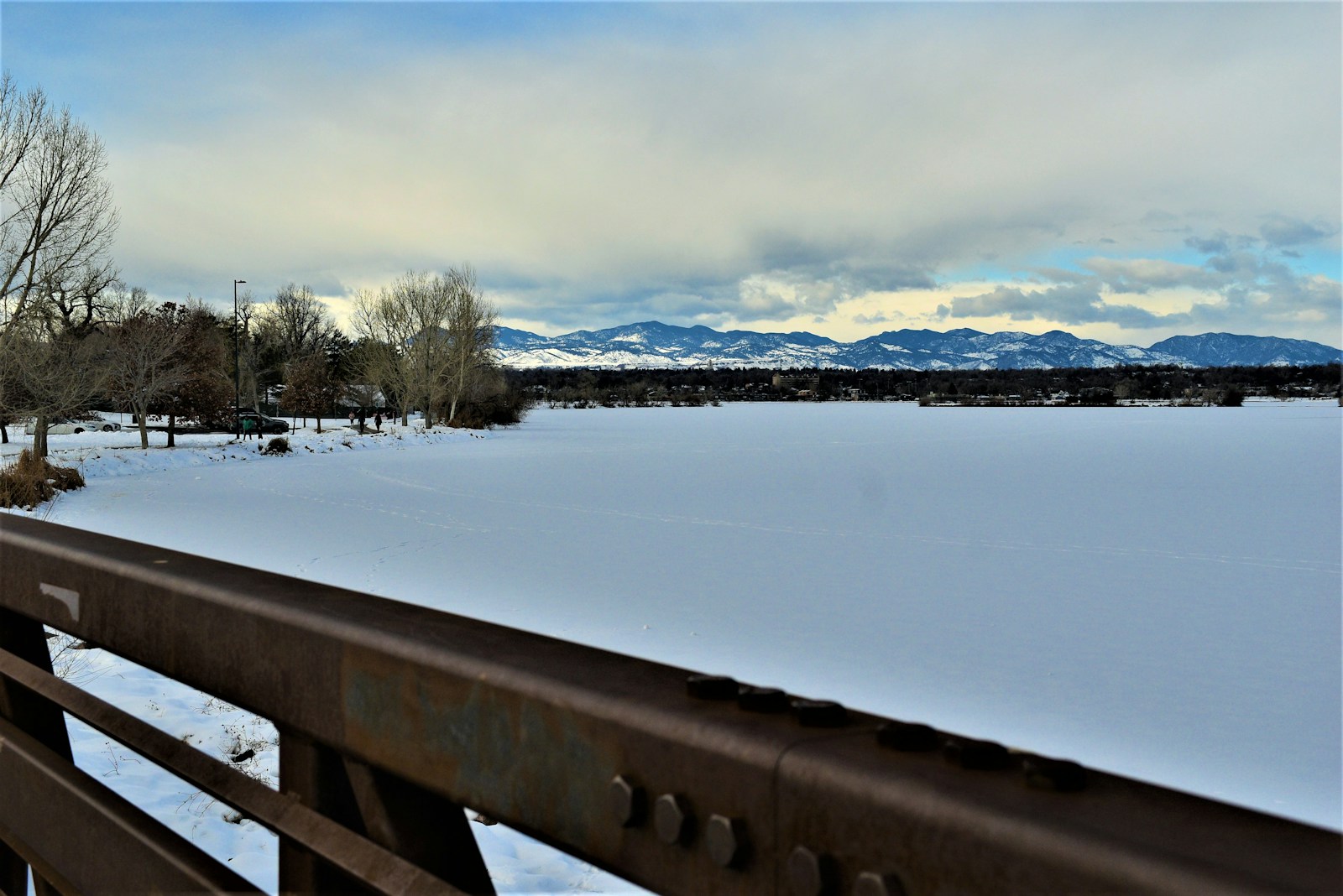 Denver skyline with snow-capped Rocky Mountains behind