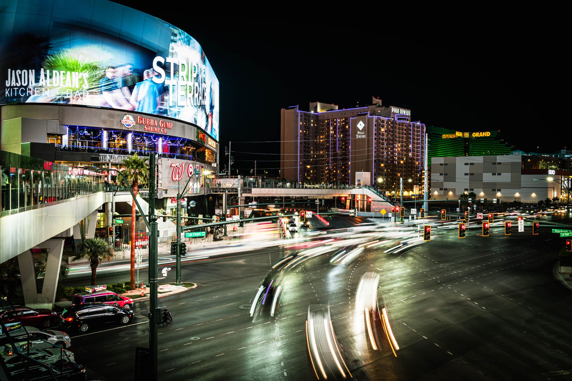 Las Vegas Strip at night with fountains and neon lights