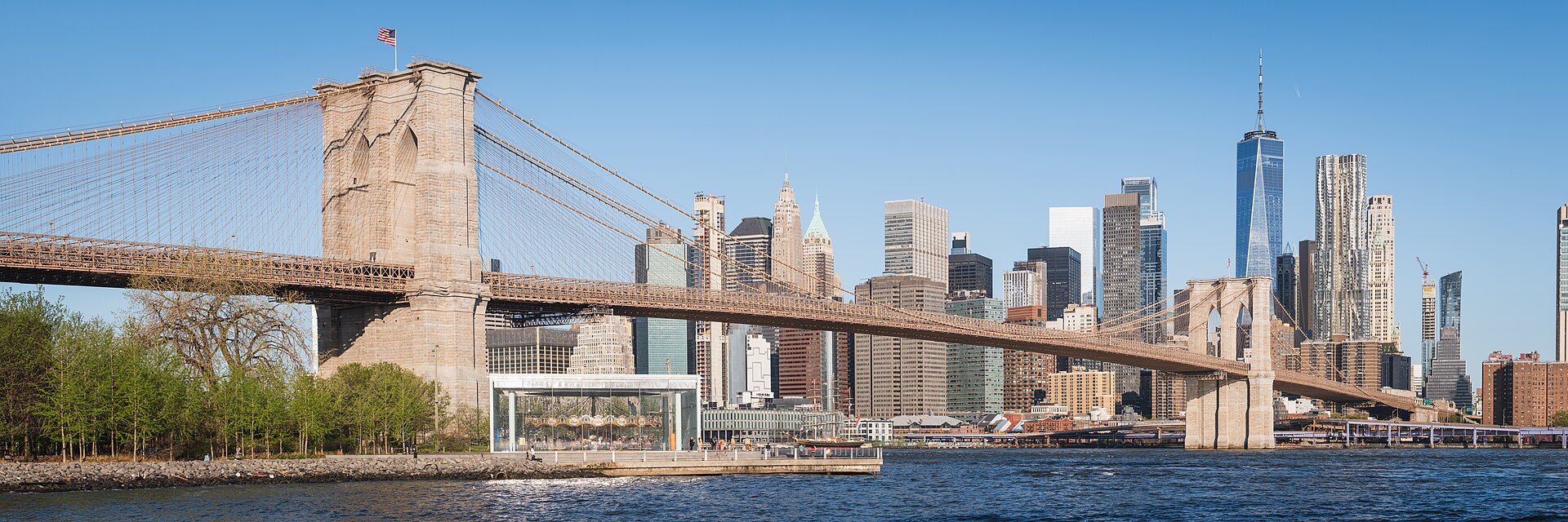 New York Manhattan skyline from Brooklyn Bridge at dusk