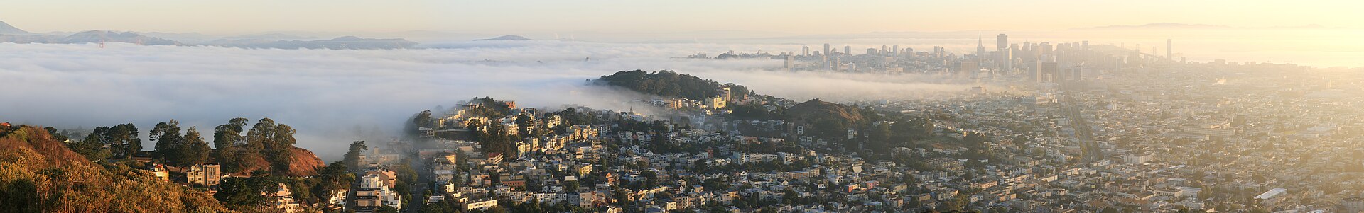 Golden Gate Bridge with San Francisco fog rolling over the towers